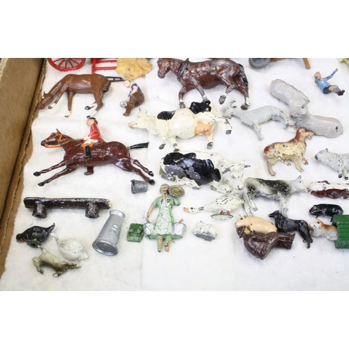 459 - Over 40 Mid 20th C metal farm animals, figures and accessories, mainly Britains, also featuring Timp... 