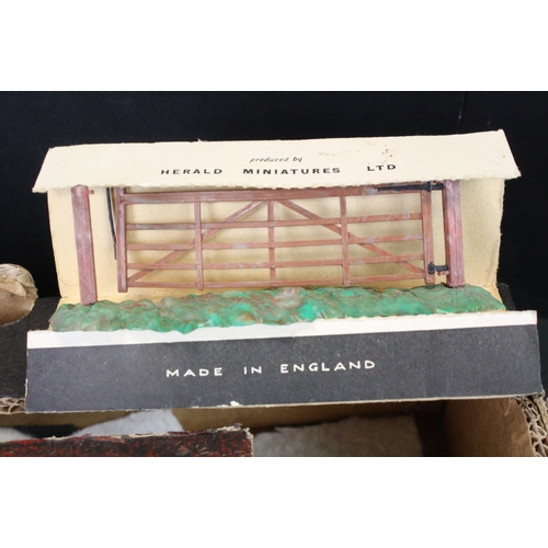 459 - Over 40 Mid 20th C metal farm animals, figures and accessories, mainly Britains, also featuring Timp... 