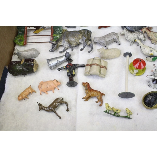 460 - Over 40 Mid 20th C metal figures, mostly farm animals, figures and accessories, mainly Britains, to ... 