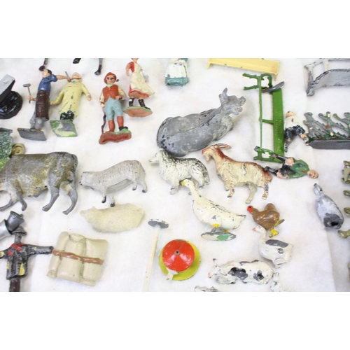 460 - Over 40 Mid 20th C metal figures, mostly farm animals, figures and accessories, mainly Britains, to ... 