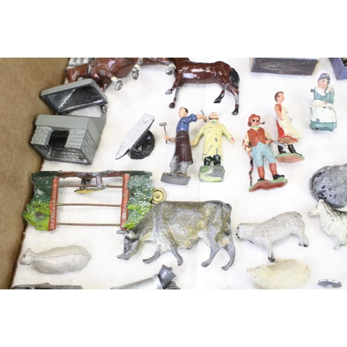 460 - Over 40 Mid 20th C metal figures, mostly farm animals, figures and accessories, mainly Britains, to ... 