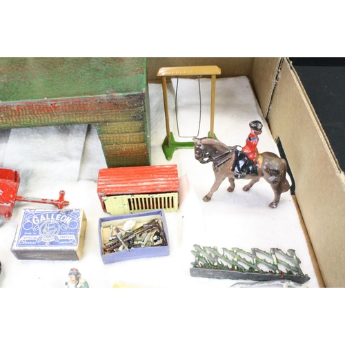 460 - Over 40 Mid 20th C metal figures, mostly farm animals, figures and accessories, mainly Britains, to ... 