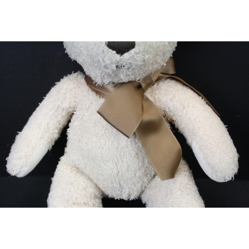 468 - Two Steiff soft toys to include 113376 Teddy Bear Cosy Year with original tag and a lying down dog