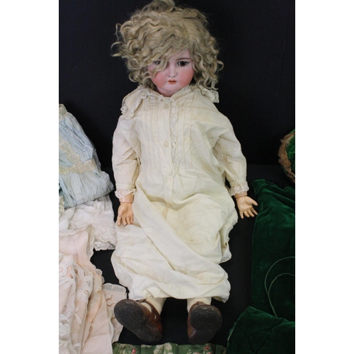 475 - A Kammer & Reinhardt, Simon & Halbig bisque head doll with sleeping brown eyes, composition body dre... 