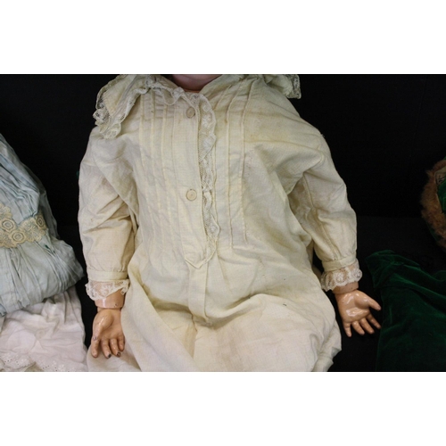 475 - A Kammer & Reinhardt, Simon & Halbig bisque head doll with sleeping brown eyes, composition body dre... 