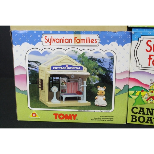 477 - Four Boxed Tomy Sylvanian Families sets to include Canal Boat no. 3036, Cottage Hospital and Nurse E... 