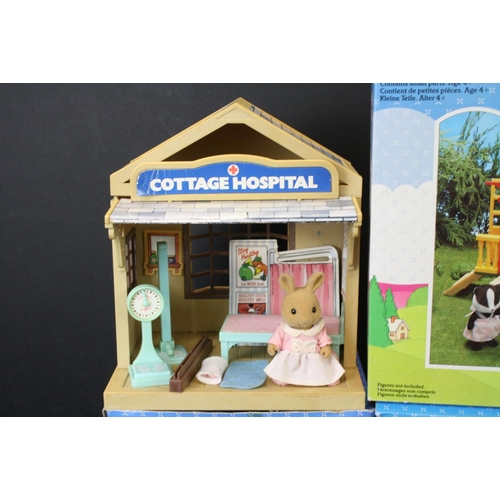 477 - Four Boxed Tomy Sylvanian Families sets to include Canal Boat no. 3036, Cottage Hospital and Nurse E... 