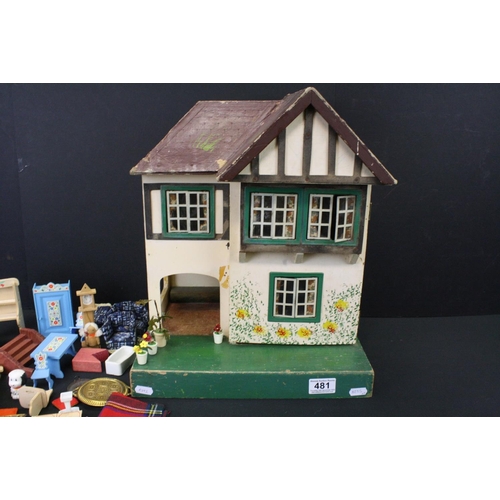 481 - Mid 20th C Triang painted wooden dolls house, Triang mark to reverse, 42cm high, together with a qua... 