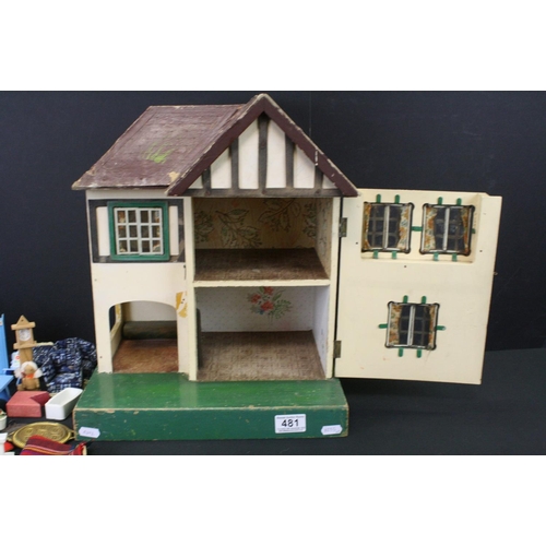 481 - Mid 20th C Triang painted wooden dolls house, Triang mark to reverse, 42cm high, together with a qua... 