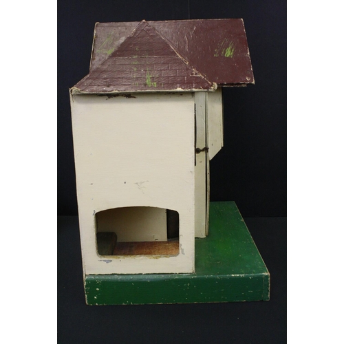 481 - Mid 20th C Triang painted wooden dolls house, Triang mark to reverse, 42cm high, together with a qua... 