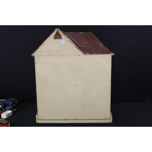 481 - Mid 20th C Triang painted wooden dolls house, Triang mark to reverse, 42cm high, together with a qua... 