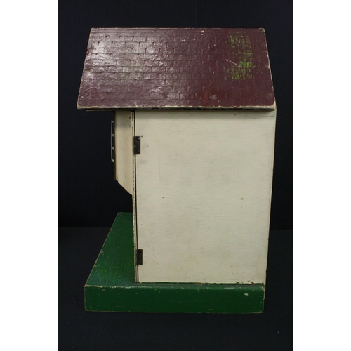 481 - Mid 20th C Triang painted wooden dolls house, Triang mark to reverse, 42cm high, together with a qua... 