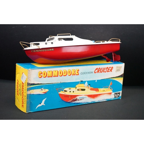 431 - Three boxed Sutcliffe metal boats to include Clockwork Hawk, Clockwork Commodore and Electric Merlin... 