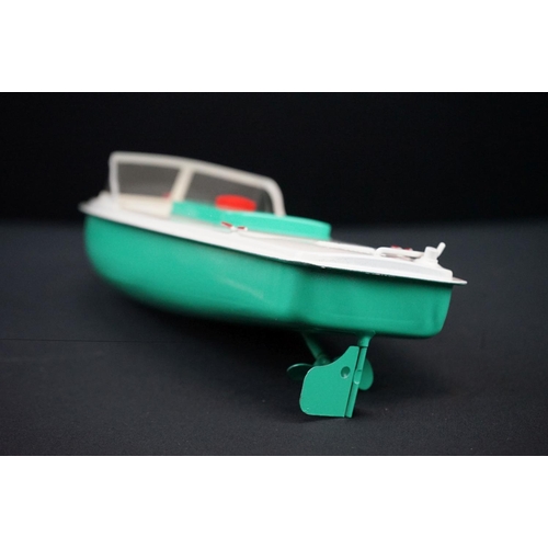 432 - Three boxed Sutcliffe clockwork metal boats to include Hawk in light green & white, Tiger Speed Boat... 