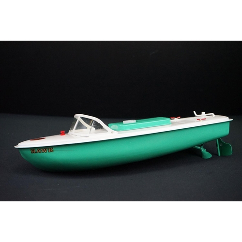 433 - Three boxed Sutcliffe metal boats to include Jupiter in red & white, Merlin electric Speed Boat in r... 