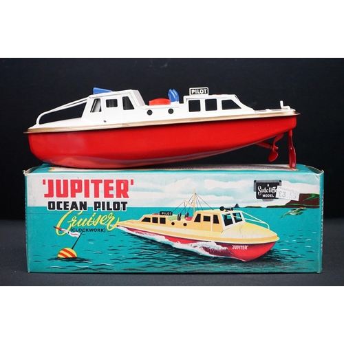 433 - Three boxed Sutcliffe metal boats to include Jupiter in red & white, Merlin electric Speed Boat in r... 