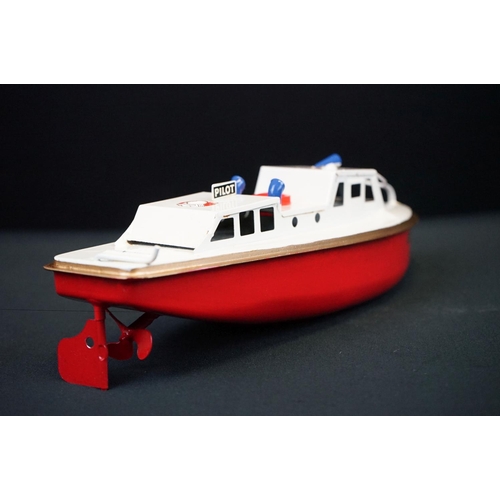 433 - Three boxed Sutcliffe metal boats to include Jupiter in red & white, Merlin electric Speed Boat in r... 