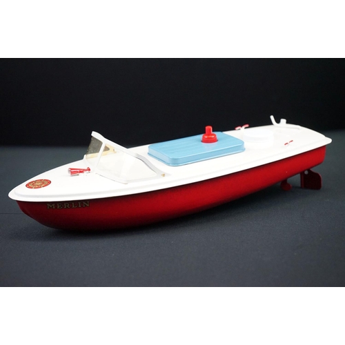 433 - Three boxed Sutcliffe metal boats to include Jupiter in red & white, Merlin electric Speed Boat in r... 