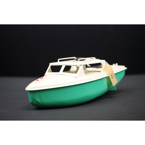 439 - Three boxed Sutcliffe clockwork metal boats to include Jupiter Ocean Pilot Cruiser in red & white, S... 