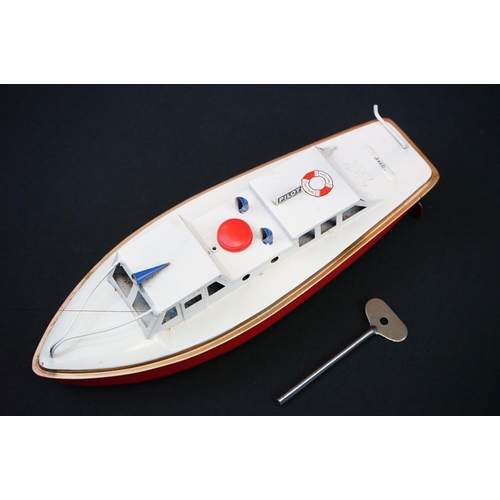 439 - Three boxed Sutcliffe clockwork metal boats to include Jupiter Ocean Pilot Cruiser in red & white, S... 