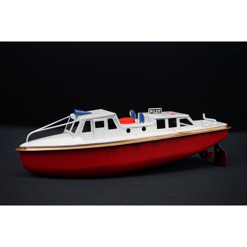 439 - Three boxed Sutcliffe clockwork metal boats to include Jupiter Ocean Pilot Cruiser in red & white, S... 