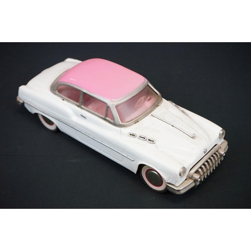 440 - Two boxed tinplate Luxe Car Heavy Gauge Sedan models, one cream with pink roof, the other blue