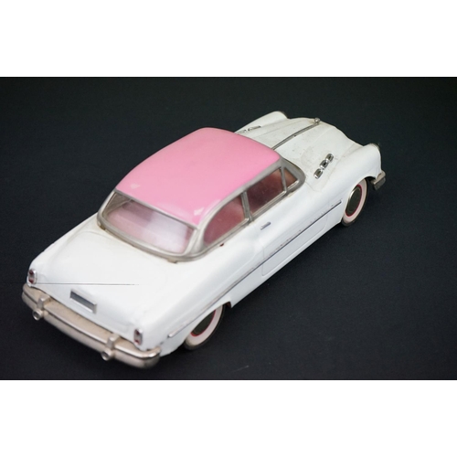 440 - Two boxed tinplate Luxe Car Heavy Gauge Sedan models, one cream with pink roof, the other blue