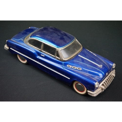 440 - Two boxed tinplate Luxe Car Heavy Gauge Sedan models, one cream with pink roof, the other blue