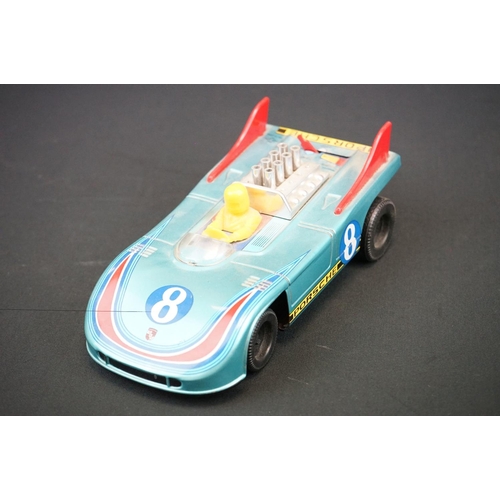 443 - Three tinplate model vehicles, to include Daiya battery operated Porsche & 2 x GDR made dodgem cars ... 