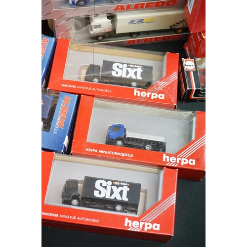 1213 - 64 Boxed plastic 1:87 model trucks to include 49 x Herpa and 15 x Albedo (models appear ex, boxes gd... 