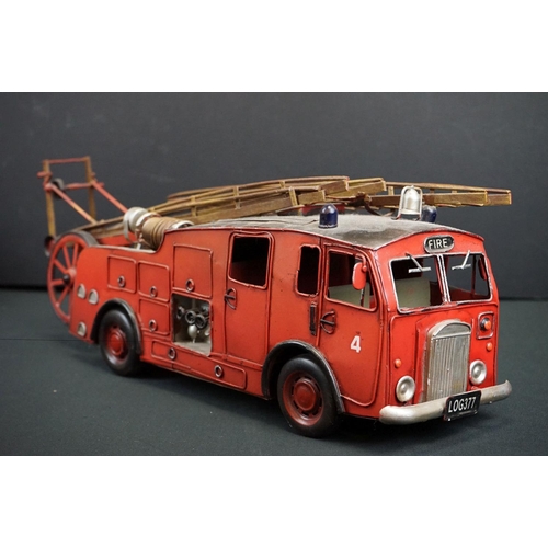 1220 - Seven assorted tinplate model vehicles, to include fire engine, steamroller, vintage racing cars, to... 