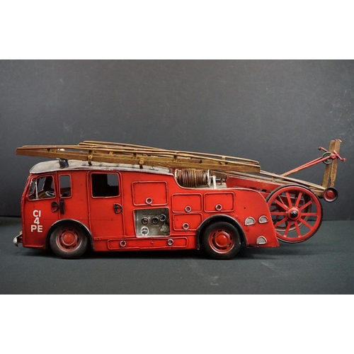 1220 - Seven assorted tinplate model vehicles, to include fire engine, steamroller, vintage racing cars, to... 