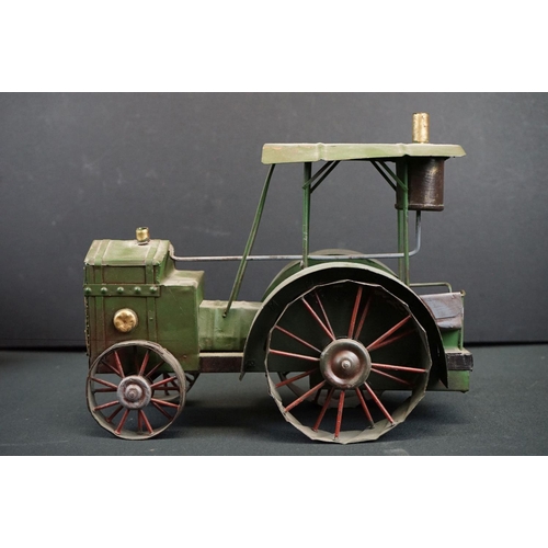 1220 - Seven assorted tinplate model vehicles, to include fire engine, steamroller, vintage racing cars, to... 