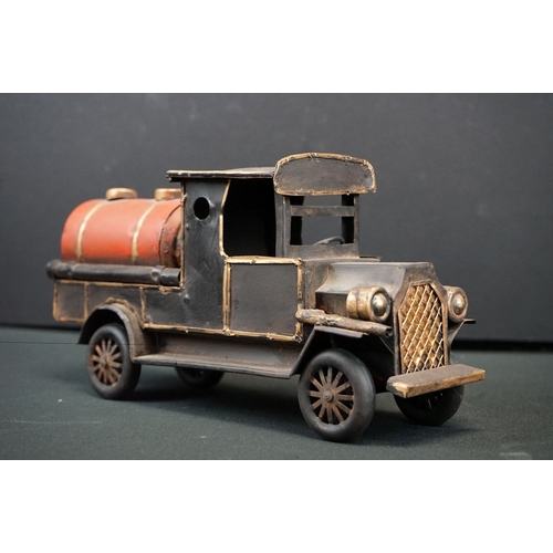 1220 - Seven assorted tinplate model vehicles, to include fire engine, steamroller, vintage racing cars, to... 