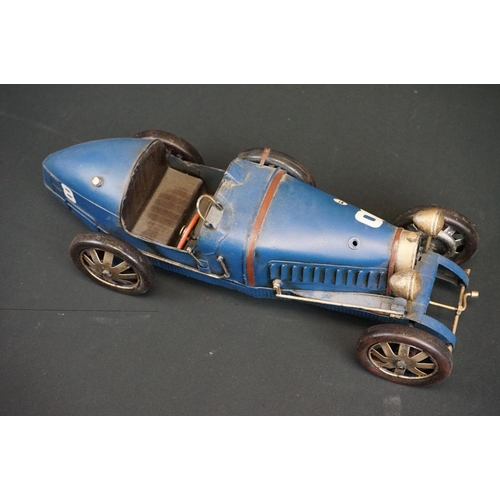 1220 - Seven assorted tinplate model vehicles, to include fire engine, steamroller, vintage racing cars, to... 