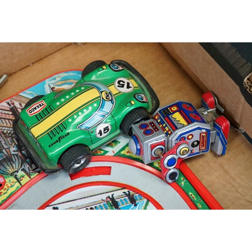 503 - Collection of tinplate toys, to include roadway with vehicles, fairground spaceship ride, various ca... 