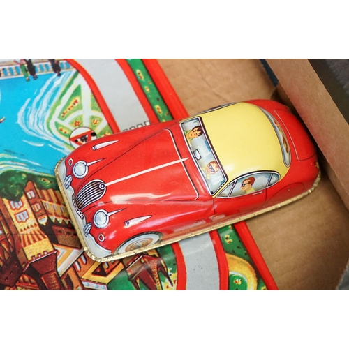 503 - Collection of tinplate toys, to include roadway with vehicles, fairground spaceship ride, various ca... 