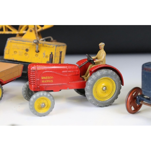 1377 - Around 20 play worn mid 20th C diecast models to include Dinky and Britains, mainly featuring farmin... 