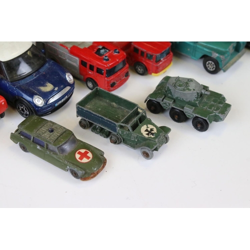 1379 - Over 30 play worn Mid 20th C onwards diecast models, mostly Dinky and Matchbox, to include military ... 