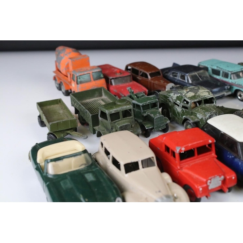 1379 - Over 30 play worn Mid 20th C onwards diecast models, mostly Dinky and Matchbox, to include military ... 