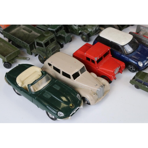 1379 - Over 30 play worn Mid 20th C onwards diecast models, mostly Dinky and Matchbox, to include military ... 