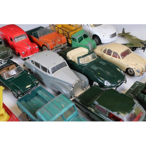 1379 - Over 30 play worn Mid 20th C onwards diecast models, mostly Dinky and Matchbox, to include military ... 