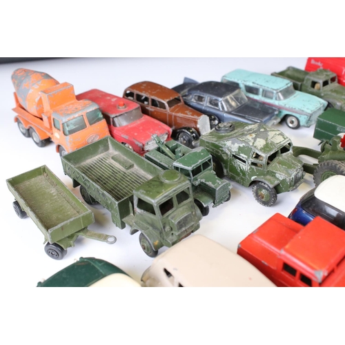 1379 - Over 30 play worn Mid 20th C onwards diecast models, mostly Dinky and Matchbox, to include military ... 