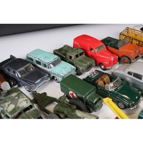 1379 - Over 30 play worn Mid 20th C onwards diecast models, mostly Dinky and Matchbox, to include military ... 