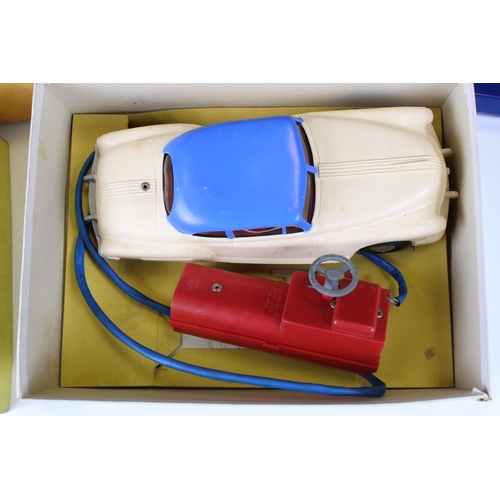 1385 - Boxed Marx Battery Operated Electric Car in white with blue roof and red controller plus a boxed Cor... 