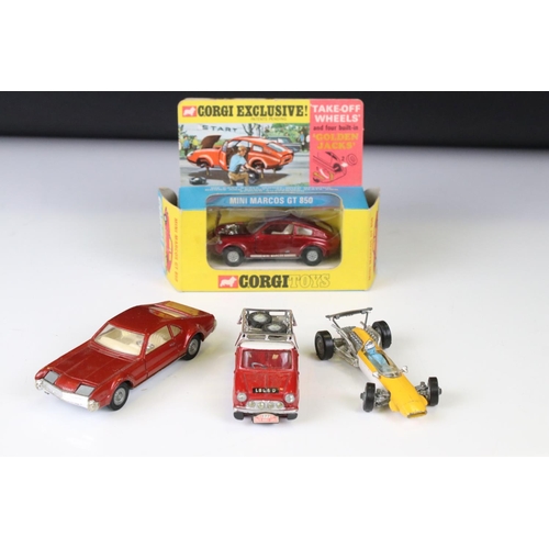 1386 - Boxed Corgi 341 Mini Marcos GT 850 diecast model in metallic red (a few spots of paint loss and box ... 