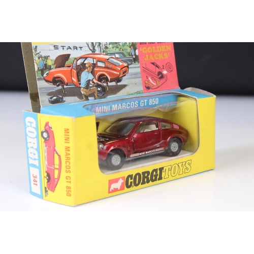 1386 - Boxed Corgi 341 Mini Marcos GT 850 diecast model in metallic red (a few spots of paint loss and box ... 