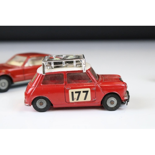 1386 - Boxed Corgi 341 Mini Marcos GT 850 diecast model in metallic red (a few spots of paint loss and box ... 