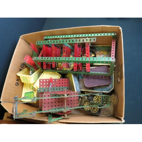 416 - Quantity of Meccano to include wheels, pulleys, angle girders, built seesaw etc, various colours (3 ... 