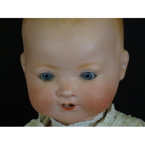 499 - Two Armand Marseille bisque headed baby dolls to include sleeping blue glass eyes, teeth, finger wea... 